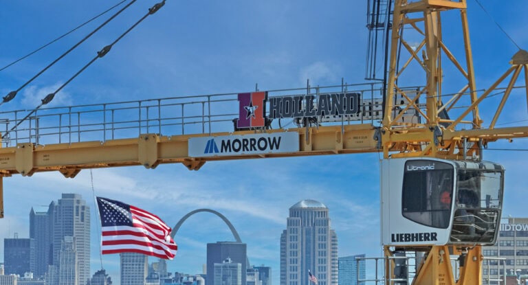 Holland Construction celebrates 3 executive-level promotions