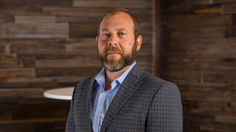 Tim Flacke, Hired at Holland Construction Services Inc.